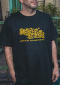 Polera negra Fiesta del Sol – diseño inspirado en el arte rupestre chileno